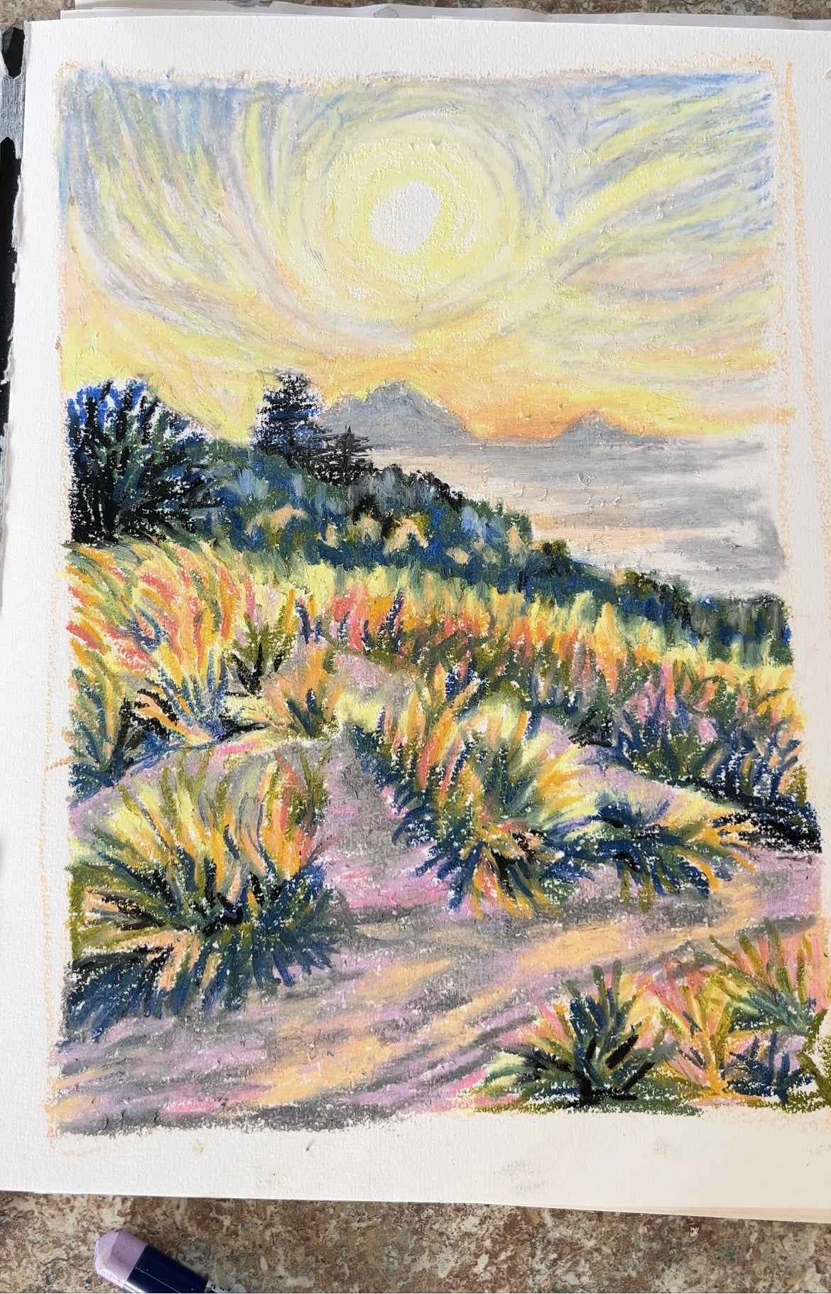 Watch me create an oil pastel artwork of a beach landscape